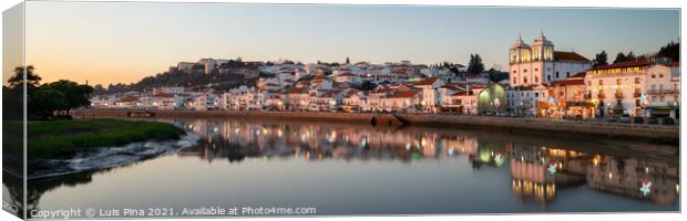 Panorama view of Alcacer do Sal cityscape from the other side of the Sado river at sunset Canvas Print by Luis Pina