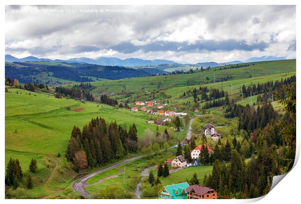 A picturesque landscape of a Carpathian village with a winding road and colorful roofs in early spring. Print by Sergii Petruk