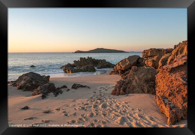 Porto Covo beach at sunset with Ilha do Pessegueiro Island on the background, in Portugal Framed Print by Luis Pina