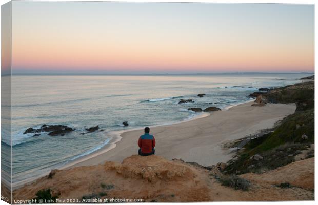 Man seeing Praia do Malhao beach view at sunrise, in Portugal Canvas Print by Luis Pina