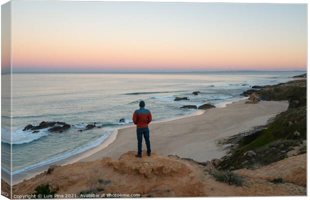 Man seeing Praia do Malhao beach view at sunrise, in Portugal Canvas Print by Luis Pina