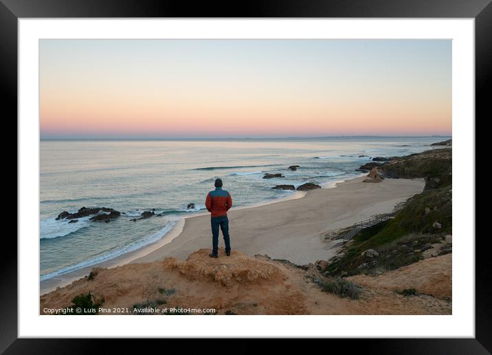 Man seeing Praia do Malhao beach view at sunrise, in Portugal Framed Mounted Print by Luis Pina