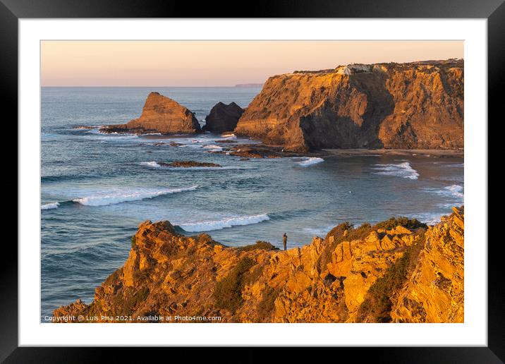 Woman on a cliff at Praia de Odeceixe in Costa Vicentina, Portugal Framed Mounted Print by Luis Pina