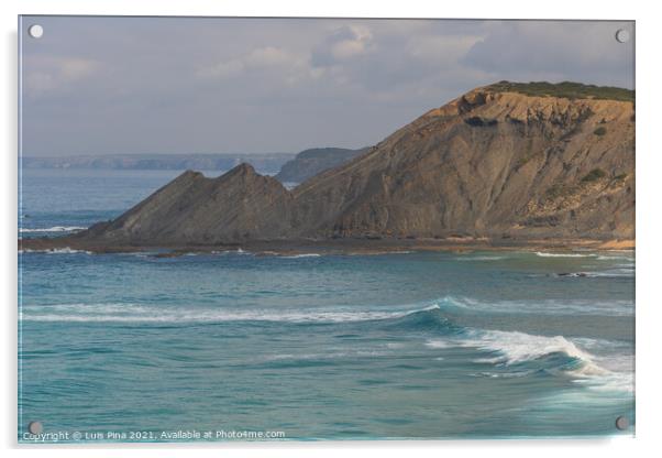 Aljezur beach with waves crashing and sea cliffs on the background Acrylic by Luis Pina