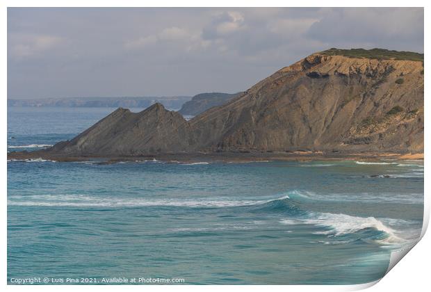 Aljezur beach with waves crashing and sea cliffs on the background Print by Luis Pina