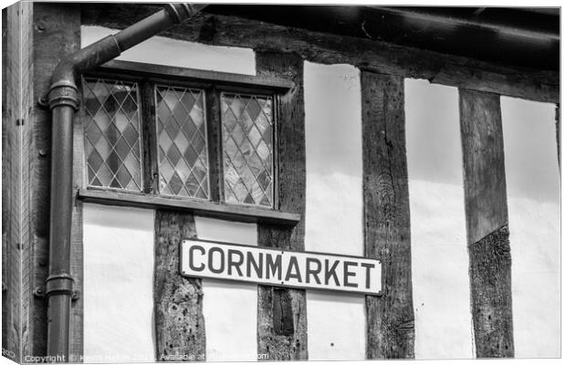 Cornmarket sign on timber framed building Canvas Print by Kevin Hellon