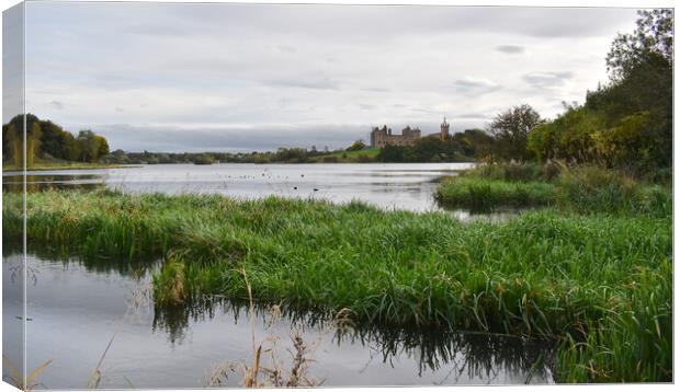 Linlithgow Loch and Palace in the background Canvas Print by Theo Spanellis