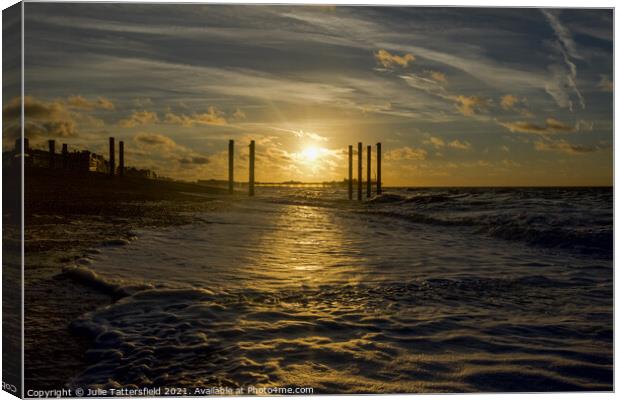 Brighton pier glowing in the sunrise Canvas Print by Julie Tattersfield