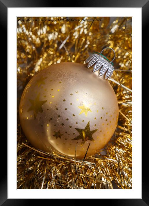 Golden Christmas ball and tinsel Framed Mounted Print by aurélie le moigne