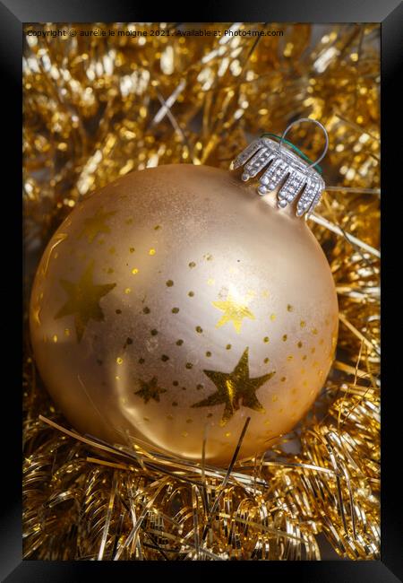 Golden Christmas ball and tinsel Framed Print by aurélie le moigne
