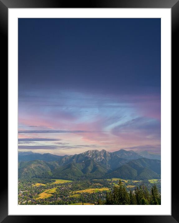 Vertical view of mountains in nature of sleeping knight tatra mountain covered with dramatic clouds aka as giewont and dramatic sunset or sunrise located in Zakopane, South Poland, Europe. Framed Mounted Print by Arpan Bhatia