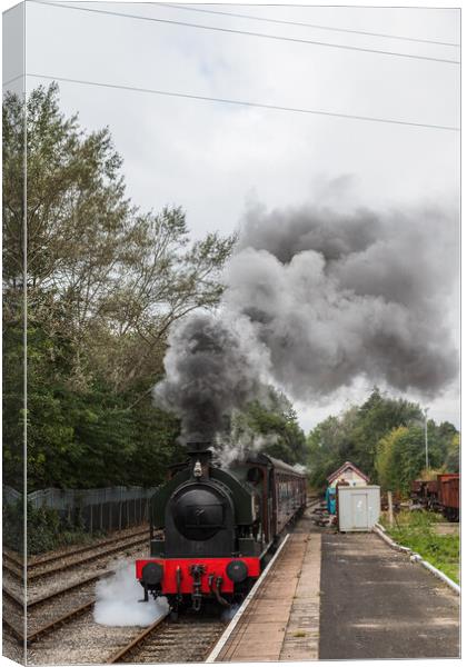 Steam train approaching a platform Canvas Print by Jason Wells