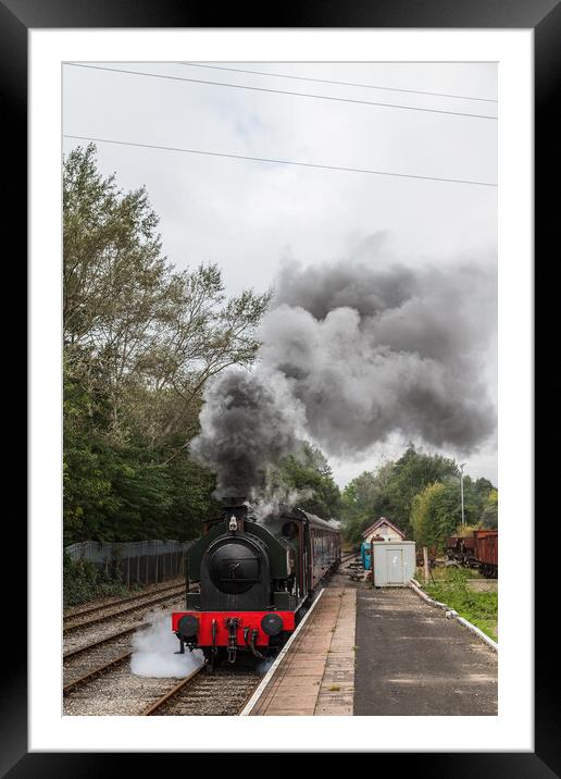 Steam train approaching a platform Framed Mounted Print by Jason Wells