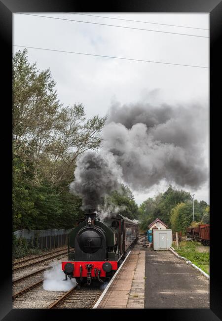 Steam train approaching a platform Framed Print by Jason Wells