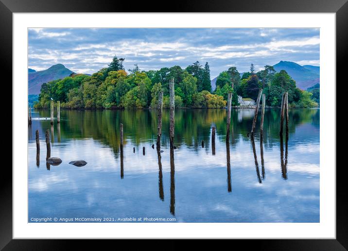 Derwent Isle and old jetty piles  Framed Mounted Print by Angus McComiskey