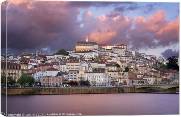 Coimbra city view at sunset with Mondego river and beautiful historic buildings, in Portugal Canvas Print by Luis Pina