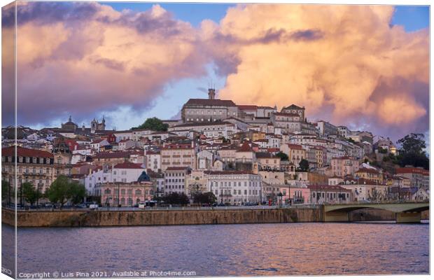 Coimbra city view at sunset with Mondego river and beautiful historic buildings, in Portugal Canvas Print by Luis Pina