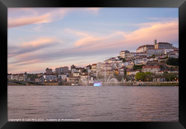 Coimbra city view at sunset with Mondego river and beautiful historic buildings, in Portugal Framed Print by Luis Pina