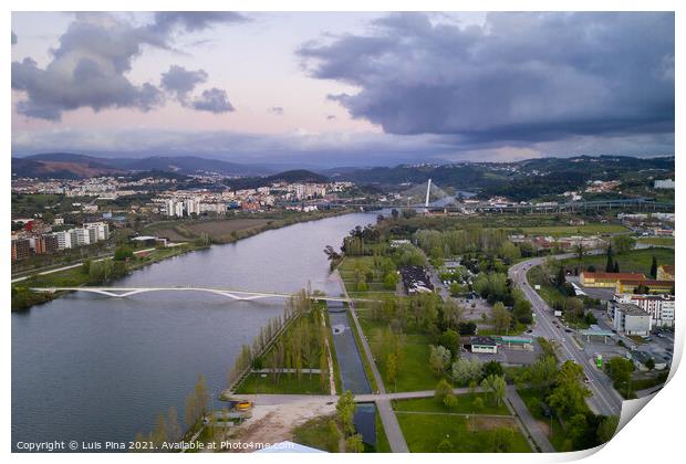 Coimbra drone aerial view of the city park, buildings and bridges at sunset, in Portugal Print by Luis Pina