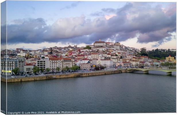 Coimbra drone aerial city view at sunset with Mondego river and beautiful historic buildings, in Portugal Canvas Print by Luis Pina