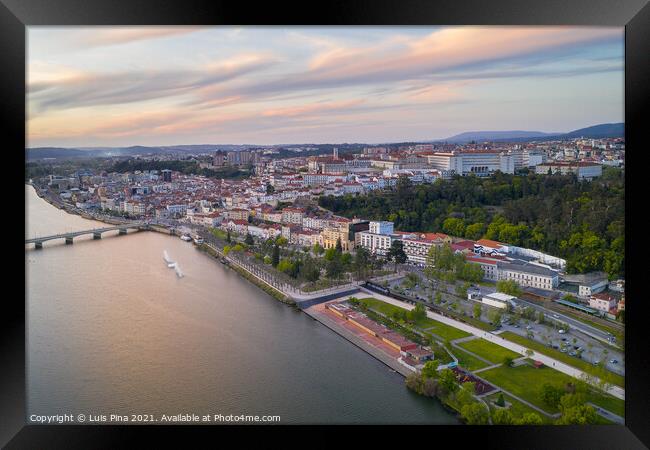 Coimbra drone aerial city view at sunset with Mondego river and beautiful historic buildings, in Portugal Framed Print by Luis Pina
