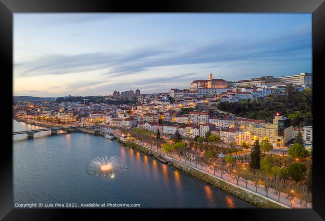 Coimbra drone aerial city view at sunset with colorful fountain in Mondego river and beautiful historic buildings, in Portugal Framed Print by Luis Pina