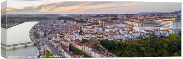 Coimbra panorama drone aerial city view at sunset with Mondego river and beautiful historic buildings, in Portugal Canvas Print by Luis Pina