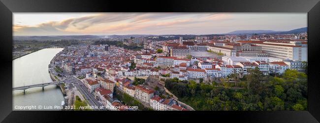 Coimbra panorama drone aerial city view at sunset with Mondego river and beautiful historic buildings, in Portugal Framed Print by Luis Pina