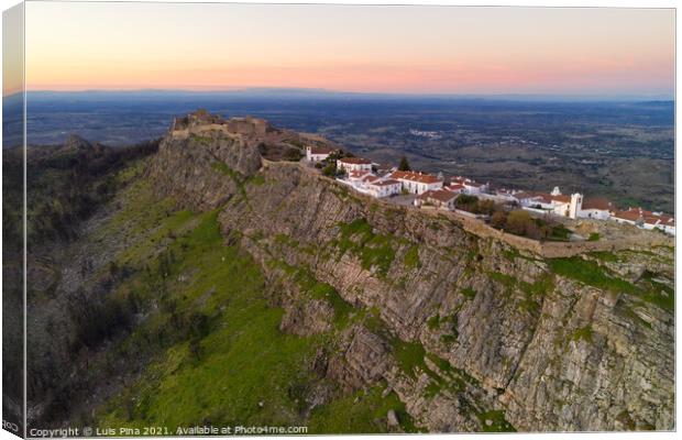 Marvao drone aerial view of the historic village and Serra de Sao Mamede mountain at sunset, in Portugal Canvas Print by Luis Pina