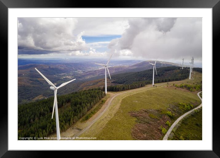 Wind turbines drone aerial view renewable energy on the middle of clouds in Serra da Lousa, Portugal Framed Mounted Print by Luis Pina