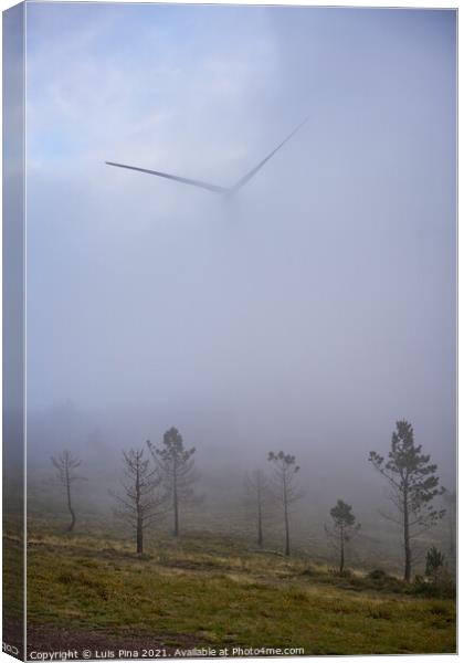 Wind turbines renewable energy on the middle of clouds in Serra da Lousa, Portugal Canvas Print by Luis Pina