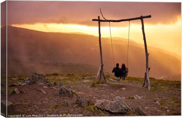 Romantic couple social distancing swinging on a Swing baloico in Lousa mountain, Portugal at sunset Canvas Print by Luis Pina