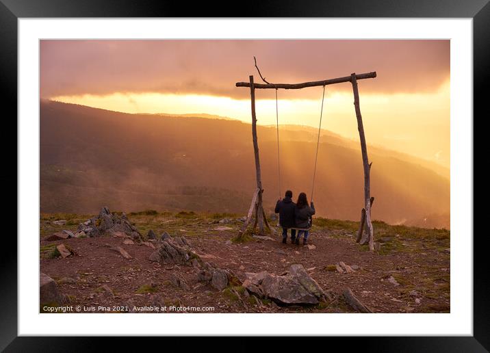 Romantic couple swinging on a Swing baloico in Lousa mountain, Portugal at sunset Framed Mounted Print by Luis Pina
