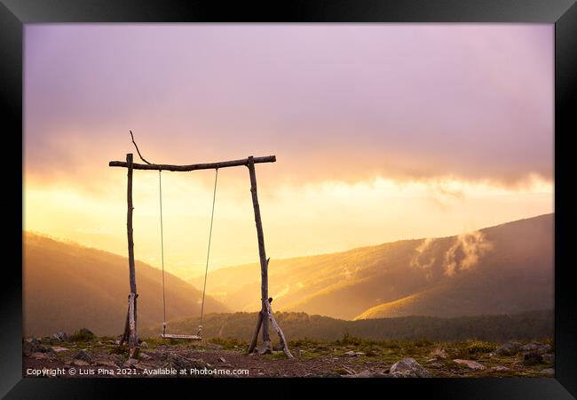 Famous Swing social distancing baloico in Lousa mountain, Portugal at sunset Framed Print by Luis Pina