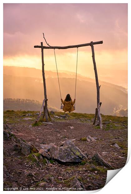 Woman girl social distancing swinging on a Swing baloico in Lousa mountain, Portugal at sunset Print by Luis Pina