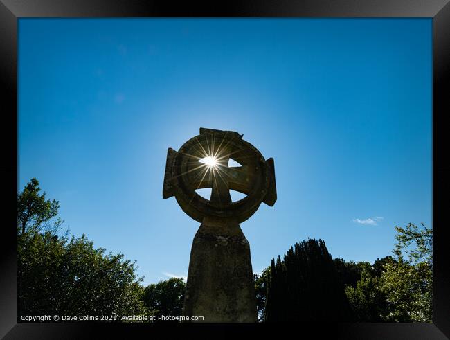 Celtic Cross with sun star burst through the upper left hand quadrant Framed Print by Dave Collins