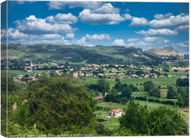 Rolling hills of Liendo Canvas Print by Roger Mechan