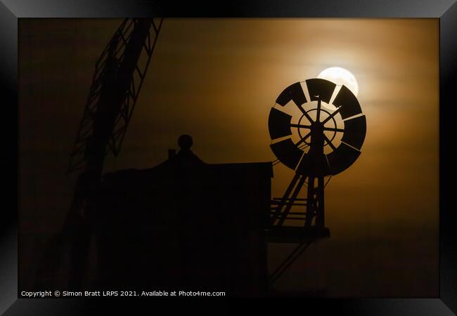 Cley windmill silhouette with full moon fantail Framed Print by Simon Bratt LRPS
