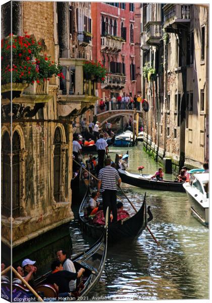 A Serene Gondola Ride Through Venice Canvas Print by Roger Mechan