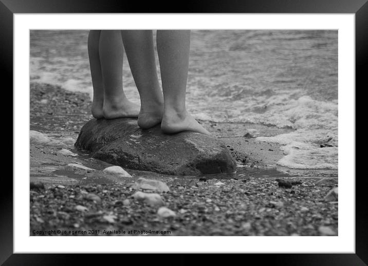 standing on a pebble beach Framed Mounted Print by jo egerton
