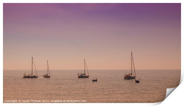 Glowing boats in tranquil Madeira Print by David Thomas