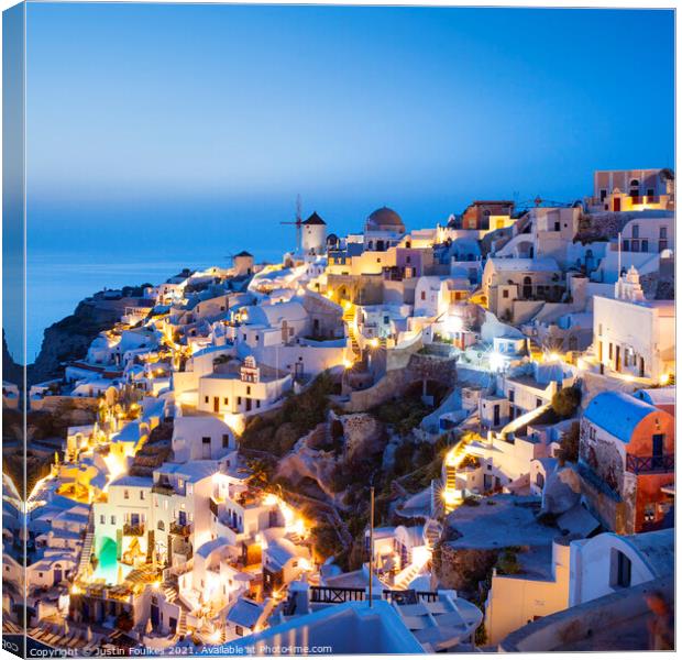 Oia at night Santorini, Greece Canvas Print by Justin Foulkes