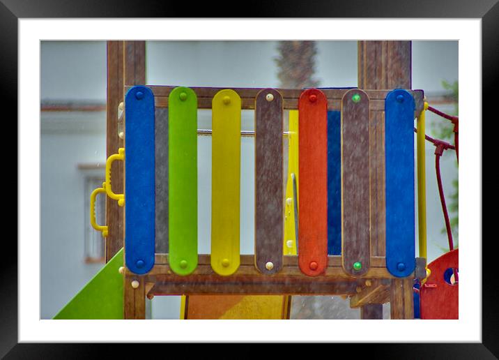 This is a rather abstract composition from a children park Framed Mounted Print by Jose Manuel Espigares Garc