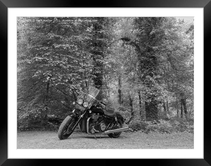 A Triumph Thunderbird Storm motorcycle parked beneath trees on a sunny day, in mono Framed Mounted Print by Mark Rosher