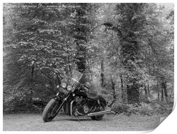 A Triumph Thunderbird Storm motorcycle parked beneath trees on a sunny day, in mono Print by Mark Rosher
