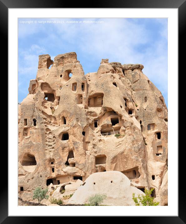 Ancient residential caves in the sandstone mountains of Cappadocia in Turkey. Framed Mounted Print by Sergii Petruk