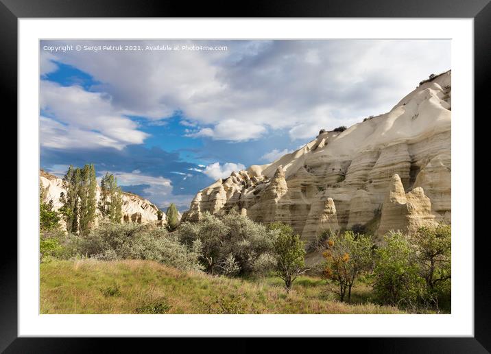 Bizarre and unusual mountain ranges and green valleys in Cappadocia in the rays of sunshine. Framed Mounted Print by Sergii Petruk
