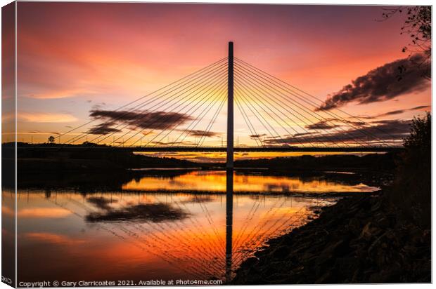 Northern Spire Sunset Canvas Print by Gary Clarricoates