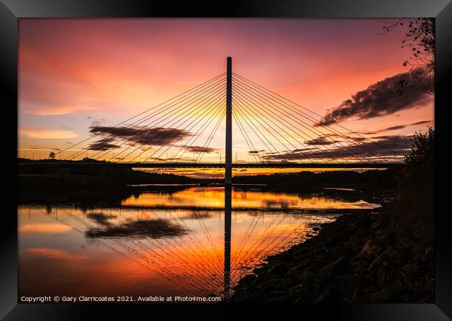 Northern Spire Sunset Framed Print by Gary Clarricoates
