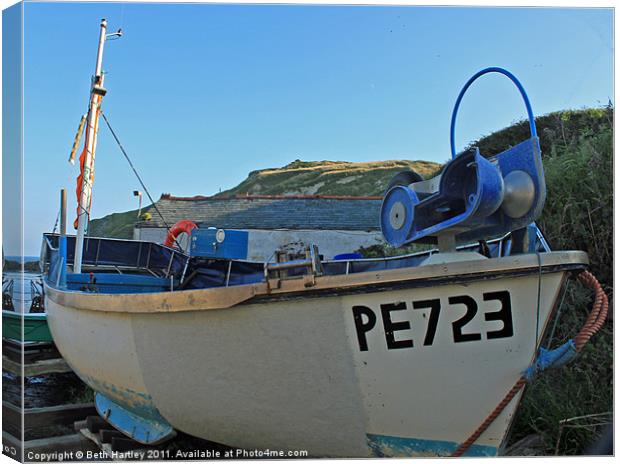 Boat at Lulworth Cove Canvas Print by Beth Hartley